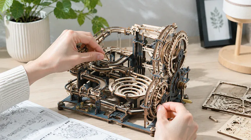 Hobby special offers banner featuring a detailed wooden 3D mechanical puzzle assembly in a bright office workspace, showcasing creative crafting projects, DIY model building, premium hobby kits, progressive discounts, and value deals for puzzle enthusiasts